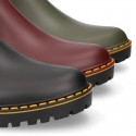 MATTE colors Ankle rain boots with elastic band and MOUNTAIN soles design.