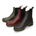 MATTE colors Ankle rain boots with elastic band and MOUNTAIN soles design.