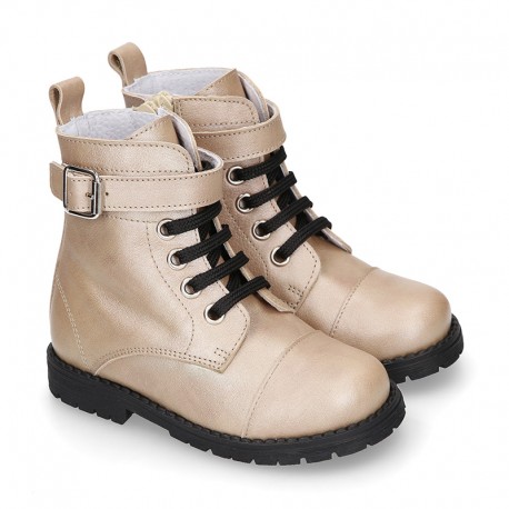 Rock style LAMINATED leather Girl boots with laces and zipper closure.