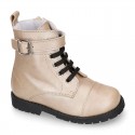 Rock style LAMINATED leather Girl boots with laces and zipper closure.