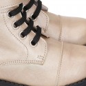 Rock style LAMINATED leather Girl boots with laces and zipper closure.