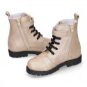 Rock style LAMINATED leather Girl boots with laces and zipper closure.