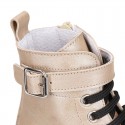 Rock style LAMINATED leather Girl boots with laces and zipper closure.