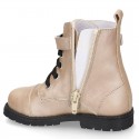 Rock style LAMINATED leather Girl boots with laces and zipper closure.