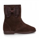 Classic Girl suede leather boots with BUTTERFLY RIBBON design.