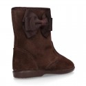 Classic Girl suede leather boots with BUTTERFLY RIBBON design.