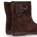 Classic Girl suede leather boots with BUTTERFLY RIBBON design.