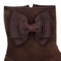 Classic Girl suede leather boots with BUTTERFLY RIBBON design.