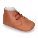 Nappa leather little bootie for babies with laces in TAN color.