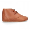 Nappa leather little bootie for babies with laces in TAN color.