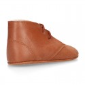 Nappa leather little bootie for babies with laces in TAN color.