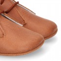 Nappa leather little bootie for babies with laces in TAN color.