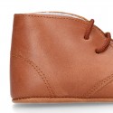 Nappa leather little bootie for babies with laces in TAN color.