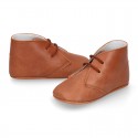 Nappa leather little bootie for babies with laces in TAN color.