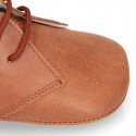 Nappa leather little bootie for babies with laces in TAN color.