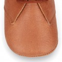 Nappa leather little bootie for babies with laces in TAN color.