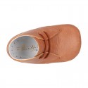 Nappa leather little bootie for babies with laces in TAN color.