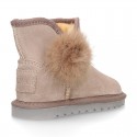 Suede leather Australian style Boot shoes with POMPOM design and fake hair lining.