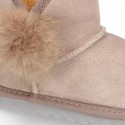 Suede leather Australian style Boot shoes with POMPOM design and fake hair lining.