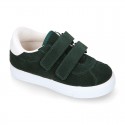 Suede leather OKAA Kids Sneaker or Tenis style shoes with double hook and loop strap closure.