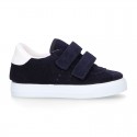 Suede leather OKAA Kids Sneaker or Tenis style shoes with double hook and loop strap closure.