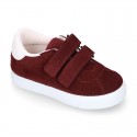 Suede leather OKAA Kids Sneaker or Tenis style shoes with double hook and loop strap closure.