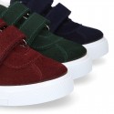 Suede leather OKAA Kids Sneaker or Tenis style shoes with double hook and loop strap closure.
