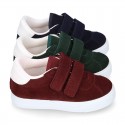 Suede leather OKAA Kids Sneaker or Tenis style shoes with double hook and loop strap closure.