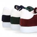 Suede leather OKAA Kids Sneaker or Tenis style shoes with double hook and loop strap closure.