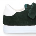 Suede leather OKAA Kids Sneaker or Tenis style shoes with double hook and loop strap closure.