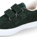 Suede leather OKAA Kids Sneaker or Tenis style shoes with double hook and loop strap closure.