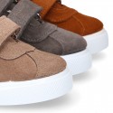 Suede leather OKAA Kids Sneaker or Tenis style shoes with double hook and loop strap closure in autumn colors.