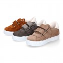 Suede leather OKAA Kids Sneaker or Tenis style shoes with double hook and loop strap closure in autumn colors.