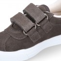 Suede leather OKAA Kids Sneaker or Tenis style shoes with double hook and loop strap closure in autumn colors.