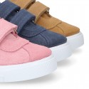 Suede leather OKAA Kids Sneaker or Tenis style shoes with double hook and loop strap closure in pastel colors.