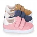 Suede leather OKAA Kids Sneaker or Tenis style shoes with double hook and loop strap closure in pastel colors.