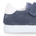 Suede leather OKAA Kids Sneaker or Tenis style shoes with double hook and loop strap closure in pastel colors.