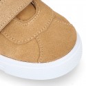 Suede leather OKAA Kids Sneaker or Tenis style shoes with double hook and loop strap closure in pastel colors.