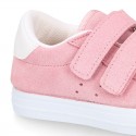 Suede leather OKAA Kids Sneaker or Tenis style shoes with double hook and loop strap closure in pastel colors.