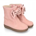 Suede leather Girl ankle boot shoes with fake hair lining and RIBBON design.