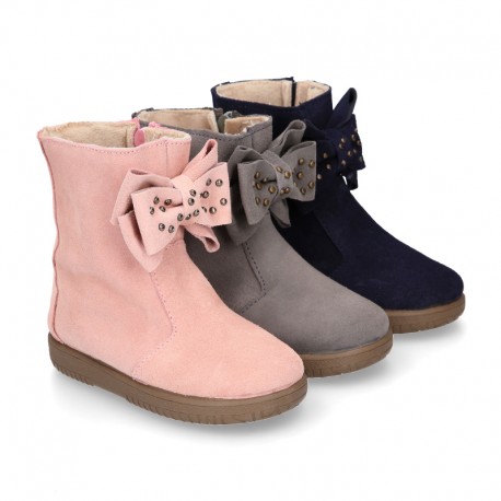 Suede leather Girl ankle boot shoes with fake hair lining and RIBBON design.