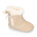 Baby girl bootie with BOW, hook and loop strap closure in suede leather.