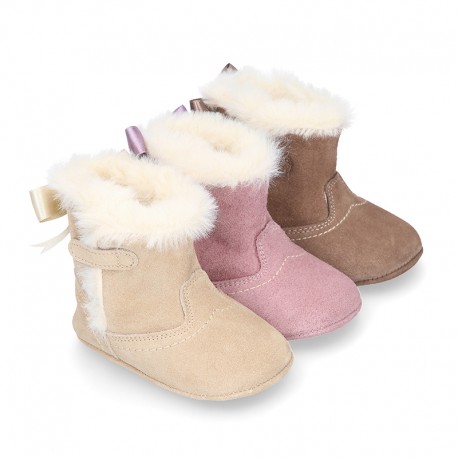 Baby girl bootie with BOW, hook and loop strap closure in suede leather.