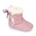 Baby girl bootie with BOW, hook and loop strap closure in suede leather.