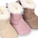 Baby girl bootie with BOW, hook and loop strap closure in suede leather.