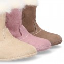 Baby girl bootie with BOW, hook and loop strap closure in suede leather.