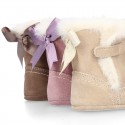 Baby girl bootie with BOW, hook and loop strap closure in suede leather.