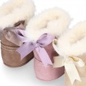 Baby girl bootie with BOW, hook and loop strap closure in suede leather.