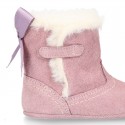 Baby girl bootie with BOW, hook and loop strap closure in suede leather.