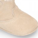 Baby girl bootie with BOW, hook and loop strap closure in suede leather.